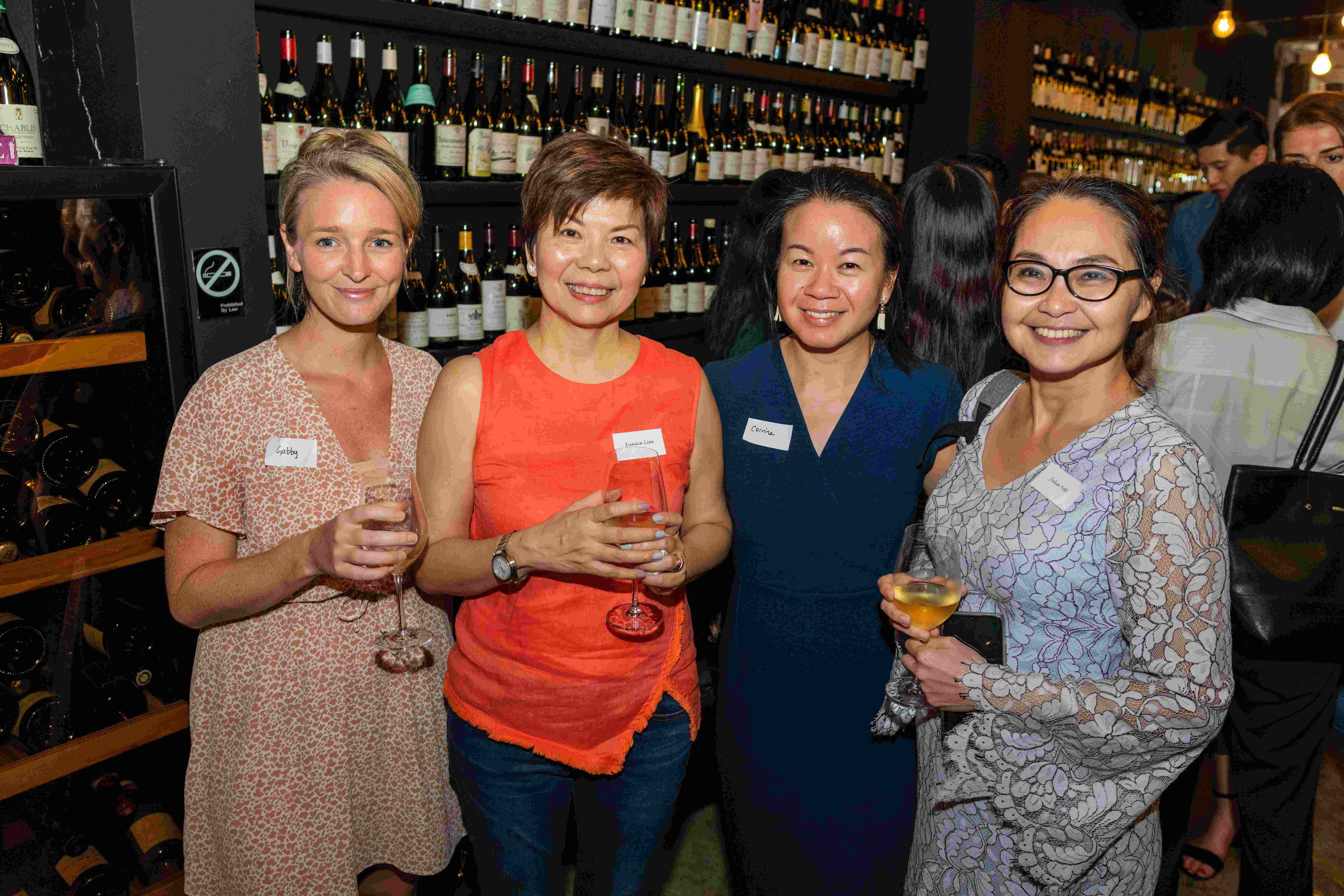 4 women in wine bar